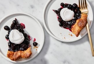 Two plater slices of Fresh Blueberry Pie